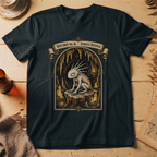Black t-shirt with a gothic illustration of a horned, single-eyed cave spirit perched on glowing crystal formations inside an arched cavern frame.