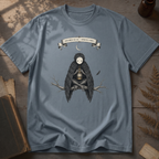 Steel blue t-shirt with a gothic illustration of a raven-winged spirit sitting on a bare branch, holding a glowing lantern, beneath a crescent moon banner reading Specimen No. 56.